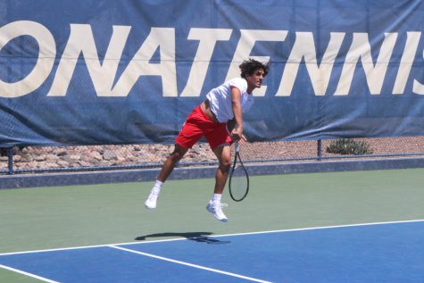 Arizona's Carlos Hassey makes a swing during a match against the University of California, Berkeley on April 3 at the Robson Tennis Center. The day ended with Arizona beating Cal for the first time in 13 years.