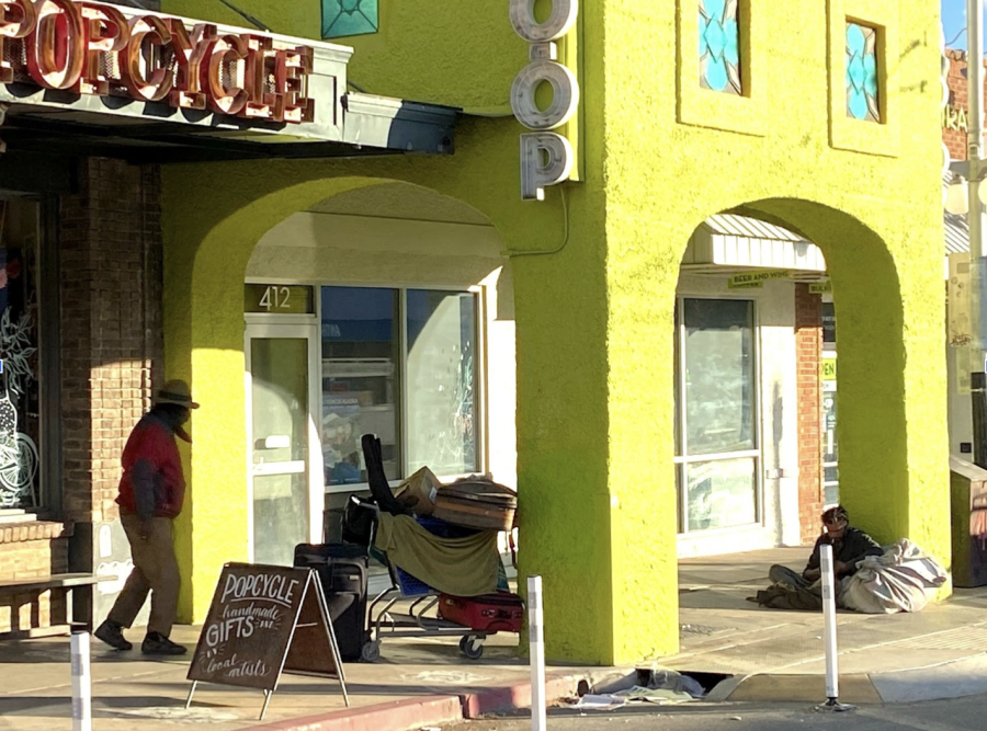 People experiencing homelessness in Tucson along Fourth Avenue.