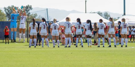 The Arizona soccer team lines up on the field as the starting line up gets announced on Sept. 4 at Mulcahy Soccer Stadium. The wildcats would end the game in a 2-2 tie after 90 minutes of play.