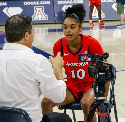 Lemyah Hylton a guard on the Arizona woman's basketball team talks to a reporter at media day in McKale Center on Sept. 30. Hylton is a 5'11 freshman from Ontario Canada.