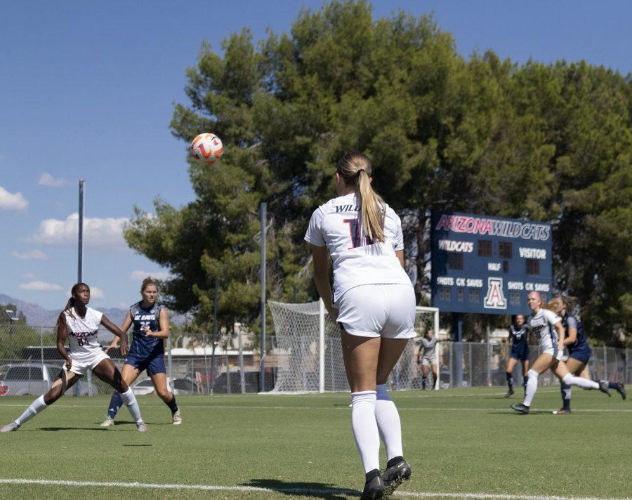 Arizona+soccer+player+Jolie+Maycumber+%2812%29+throws+a+soccer+ball+towards+a+teammate+at+Mulcahy+Soccer+Stadium+on+Sept.+18.+The+Arizona+soccer+team+won+the+game+against+University+of+California%2C+Davis+0+to+1.
