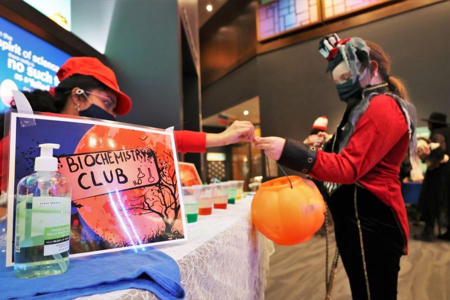 Flandrau’s Spooktacular Science aims to encourage students of all ages to engage with science no matter how frightening. The photo from the 2021 event shows an exhibit table run by the Biochemistry Club. (Courtesy of University of Arizona)