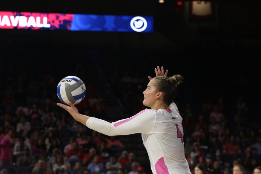 Emery Herman (4) serves the ball during a game on Friday, Oct. 7, in McKale Center. The Wildcats ultimately would lose against USC 3-2.