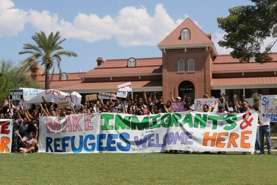 Protesters shout in unison during the Pro-DACA protest on Sept. 5, 2017, in front of Old Main. Voters may show their support for undocumented immigrants by voting in favor of Prop 308.
