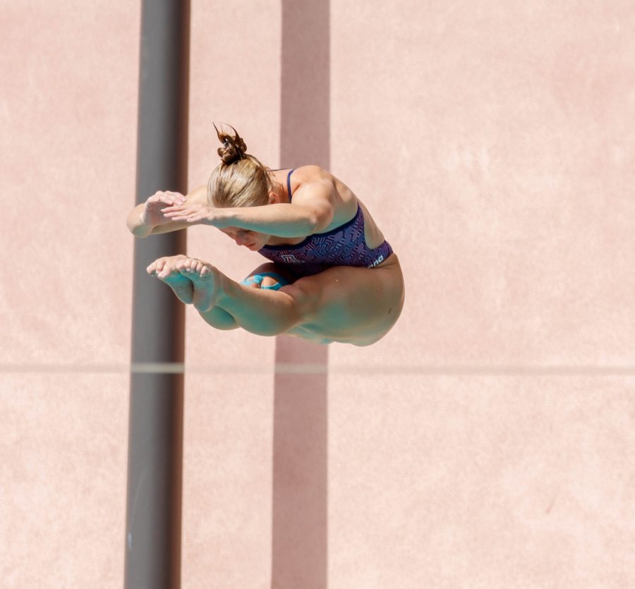 An Arizona women’s diver competes on Saturday, Oct. 15, at Hillenbrand Aquatic Center. The Arizona womens swim and dive team would get the win against Grand Canyon University 219-76. 