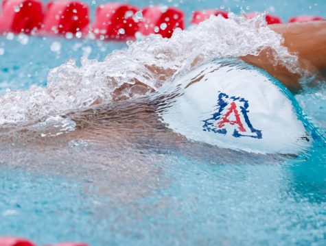 <p>An Arizona men's swimmer competes in the freestyle event on Saturday, Oct. 15, at Hillenbrand Aquatic Center. The Arizona men's swim and dive team won against Grand Canyon University 204-90. </p>