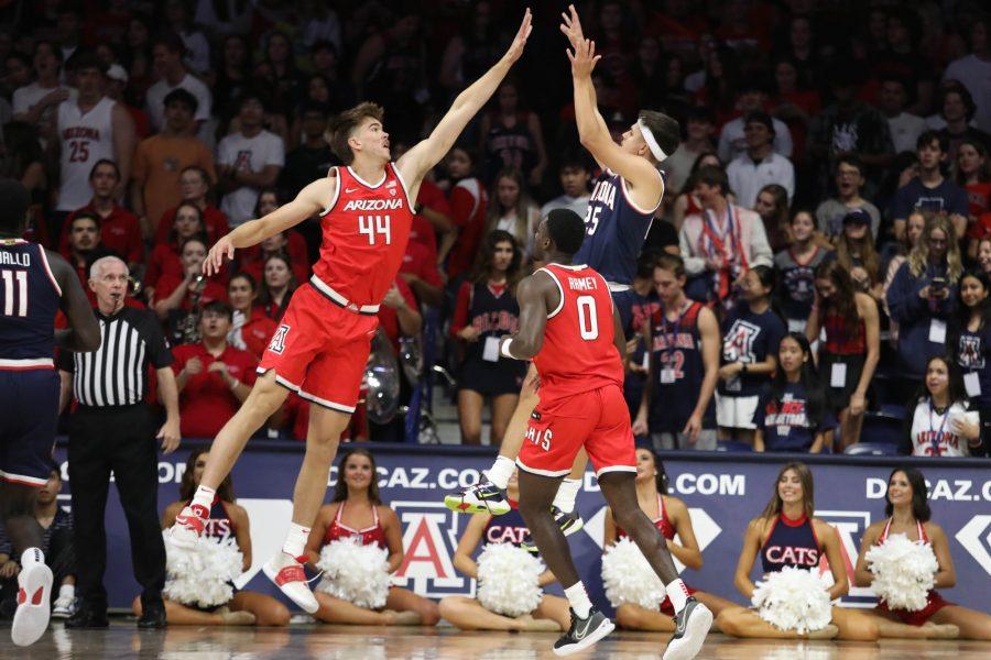 Arizona basaketball player Kerr Kriisa (25) tries to shoot the ball over a defender on Sept. 30. The Wildcat mens basketball Red-Blue game was held in McKale Center. 