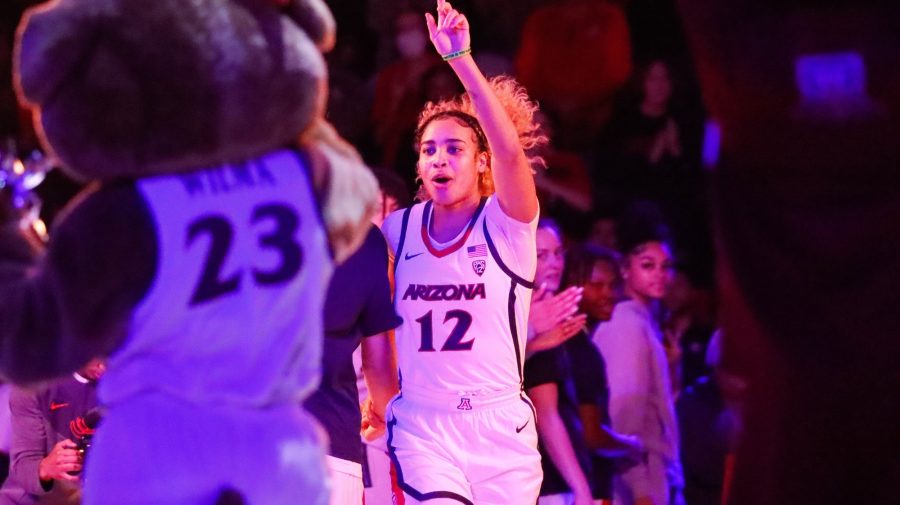 Esmery Martinez (12), an Arizona womens basketball player enters the court before a game against the University of Washington on Jan. 27, in McKale Center. The Wildcats won the game 61-54.