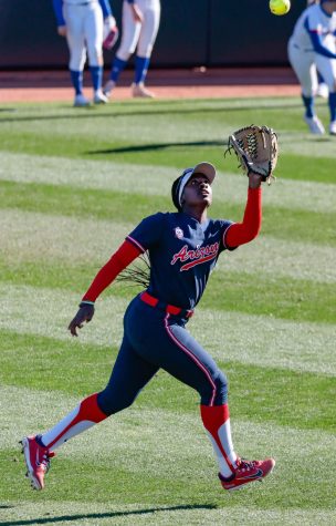 Arizona softball player Dakota Kennedy catches a pop fly in warmups before a game against the University of Kansas on Feb. 10, during the Candrea Classic at Mike Candrea Field at Rita Hillenbrand Memorial Stadium. The Wildcats won easily in five innings, blowing Kansas out 15-2. 
