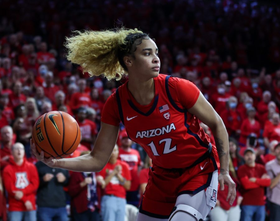 Arizona women’s basketball player Esmery Martinez grabs a rebound in McKale Center on Feb. 9. The Wildcats lost to Stanford University, 60-84.