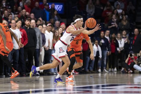 Arizona men’s basketball player Kerr Kriisa throws the ball to a teammate on Feb. 4 in McKale Center. The Wildcats won the game against Oregon State 52-84.