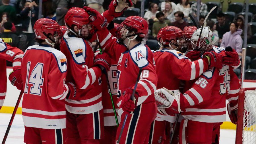 The Arizona hockey team celebrates after a game agiant rival ASU on Feb. 24, 2023 in the Tucson Conversation Center. The Wildcat hockey team won 1-0.