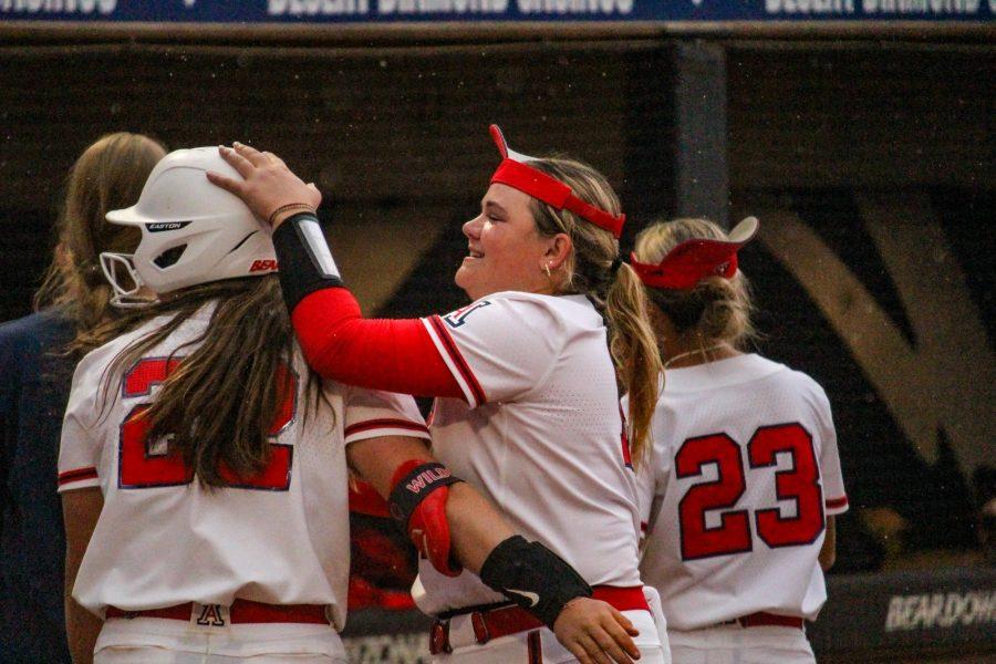 Arizonas Sydney Somerndike (right) celebrates with teammate Paige Dimler (left) at the game against New Mexico State on March 15 at Hillenbrand Stadium. The celebration was prompted after one of Dimlers two home runs. 