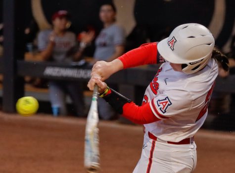 Arizona softball player Olivia DiNardo swings at a pitch on March 15 in Rita Hillenbrand Memorial Stadium. Arizona swept New Mexico State in the two games they played. 