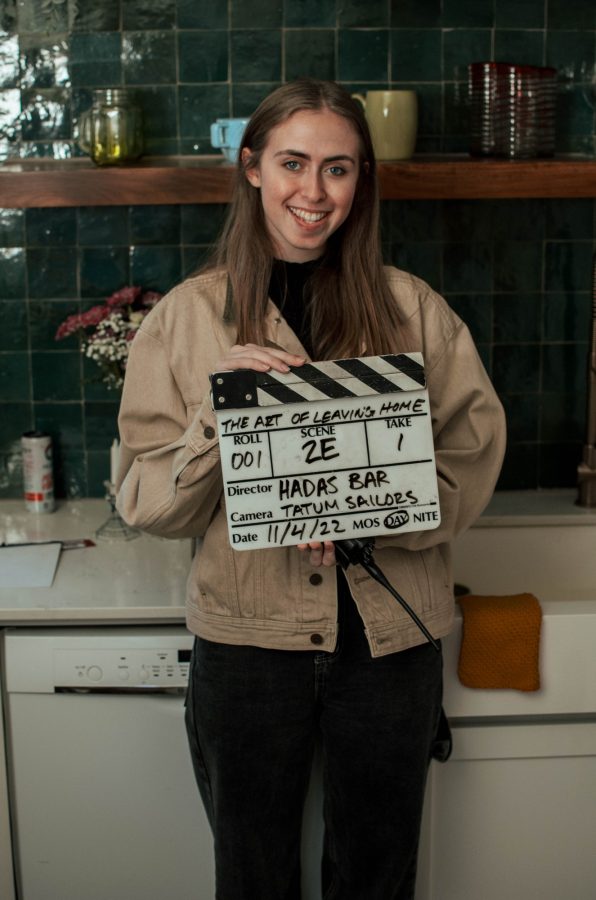 Hadas Bar holding the slate for her film, “The Art of Leaving Home.” (Photo courtesy of Hadas Bar)