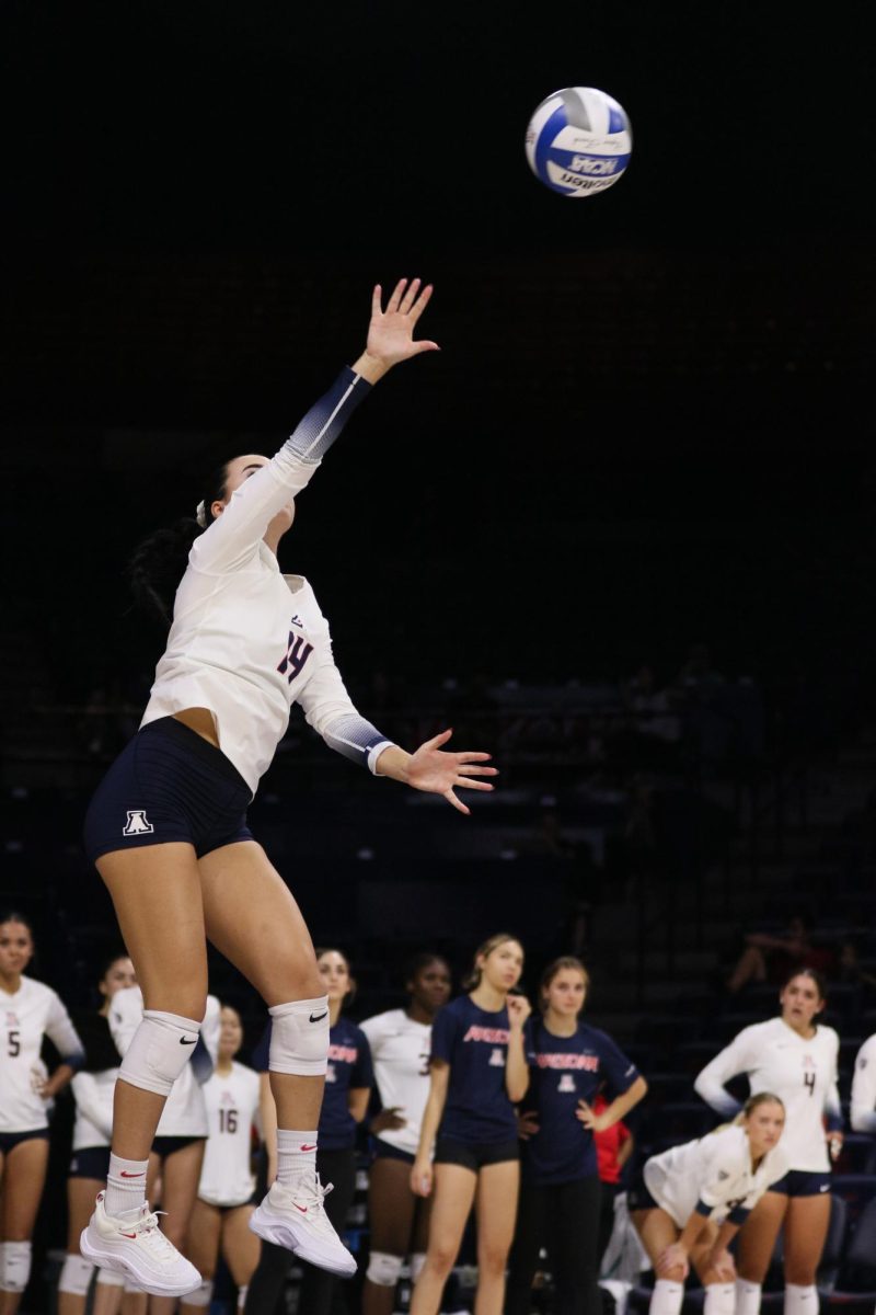 Ava Tortorello sends a serve to Pacific in their first win of the season on Aug. 26, 2023 at McKale Center.