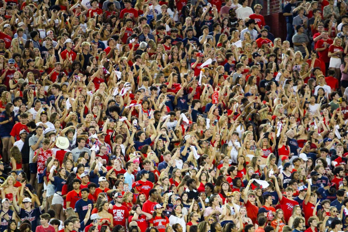 The Zona Zoo student section gets pumped for the football teams first game of the season on Sept. 2, 2023. The Wildcats secured a 38-3 win against NAU.