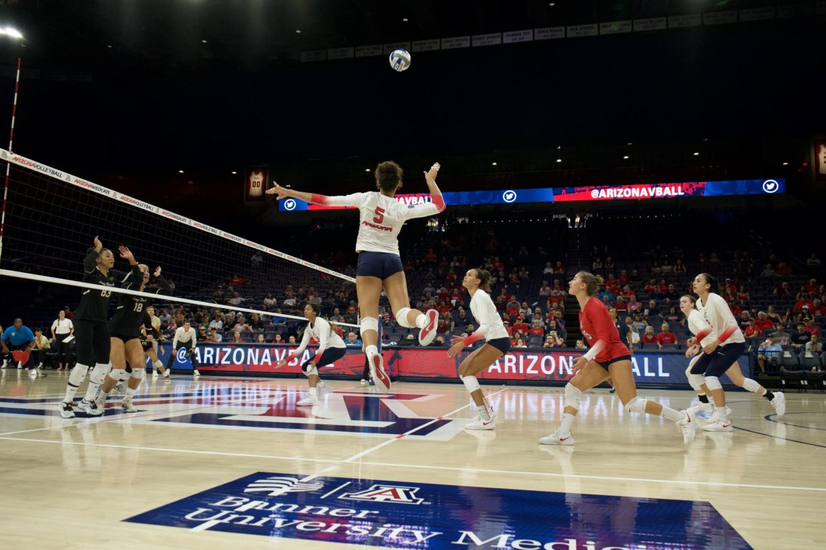 Jordan Wilson leaps to return a volley in their game against Long Beach State on Thursday, Sept. 14, 2023 at McKale Center. Jordan Wilson leaps to return a volley in their game against Long Beach State on Thursday, Sept. 14, 2023 at McKale Center. Jordan Wilson leaps to return a volley in their game against Long Beach State on Thursday, Sept. 14, 2023 at McKale Center. This game was part of the Wildcat Classic.