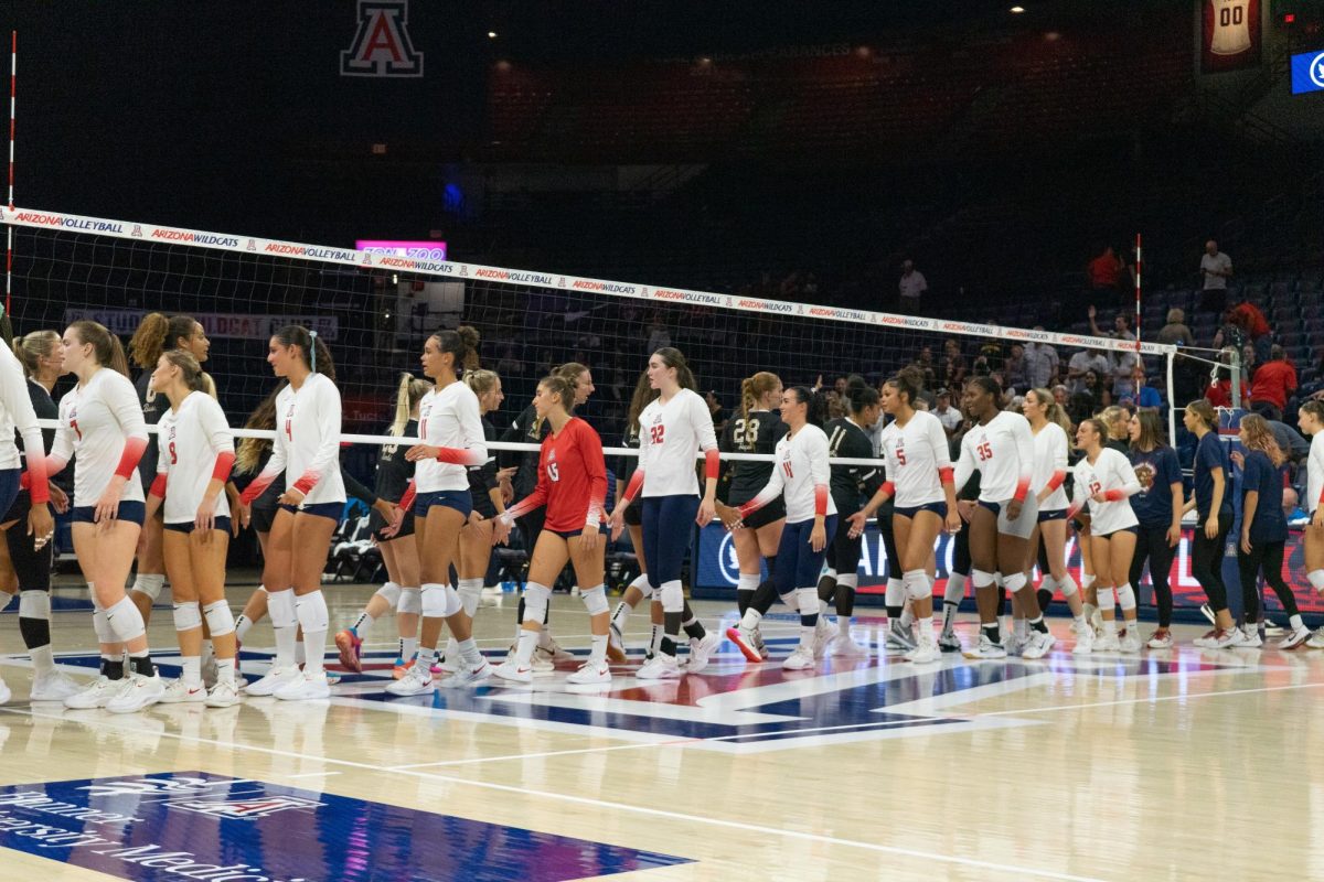 The+Arizona+volleyball+team+congratulates+Long+Beach+State+for+their+victory+on+Thursday%2C+Sept.+14%2C+in+McKale+Center.+The+Wildcats+fell+0-3+score.