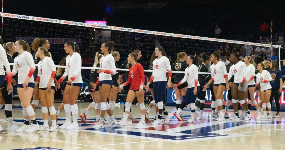 The Arizona volleyball team congratulates Long Beach State for their victory on Thursday, Sept. 14, in McKale Center. The Wildcats fell 0-3 score.