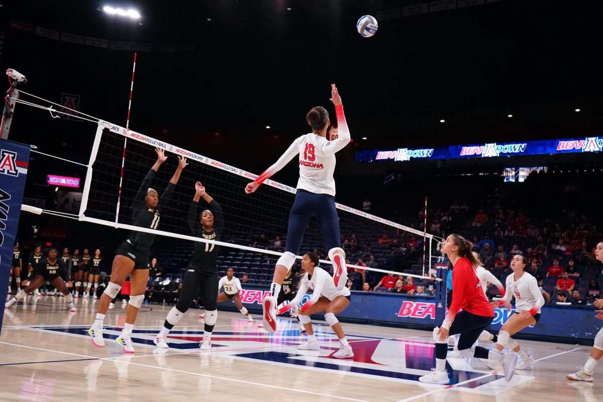 Jaelyn Hodge leaps to hit a ball over the net at the Arizona volleyball game against Alabama State on Saturday, Sept. 16, 2023. This game was part of the Wildcat Classic.