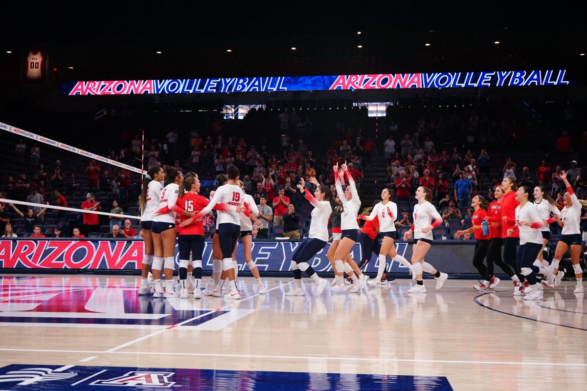 The Wildcats run onto the court to celebrate their victory over the Alabama State Hornets on Sept. 16, 2023. The Wildcats won with a score of 3-0.