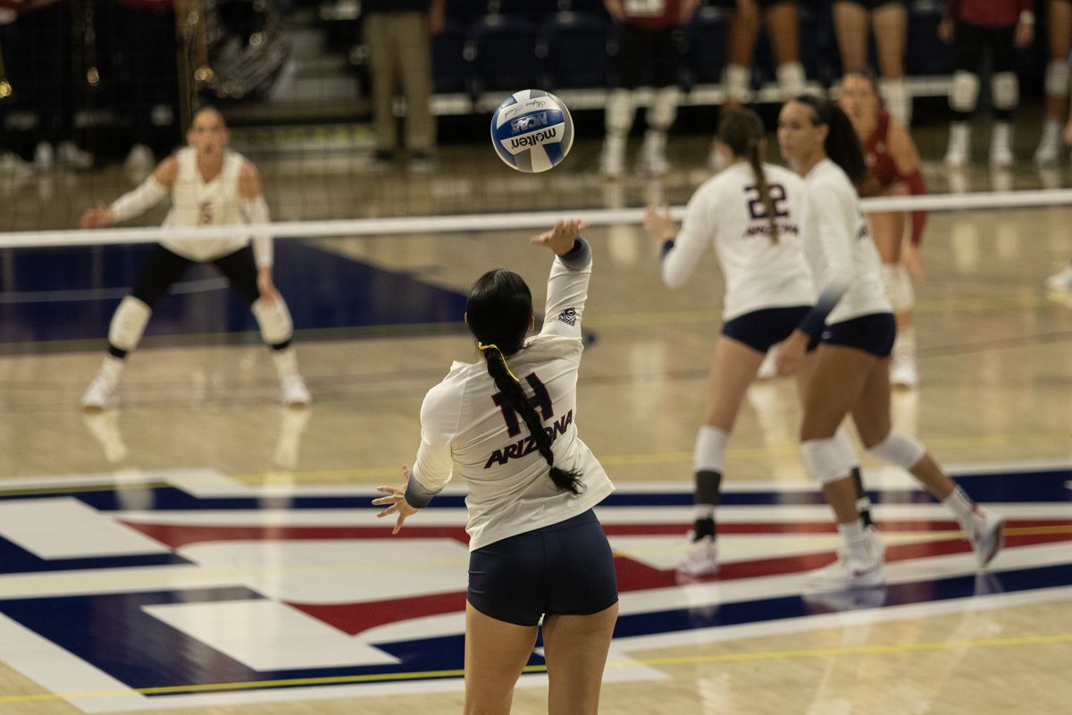Arizona volleyball player Ava Tortorello spikes a ball during the game against Washington State on Sunday, Sept. 24, in McKale Center. The Wildcats went on to lose the game 2-3 in five sets.