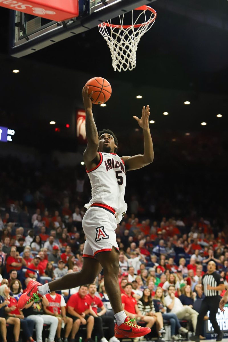KJ+Lewis+twists+for+the+field+goal+early+in+the+second+half+against+Lewis-Clark+State+College+in+McKale+Center+on+Oct.+20.+Arizona+won+convincingly+against+Lewis-Clark+State+110-70.%0A