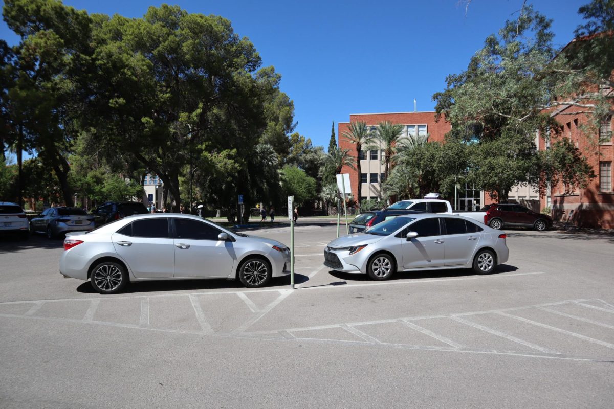 Cars are parked in lot 5073 at the University of Arizona on Sept. 19, 2023.