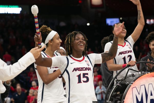 Kailyn Gilbert of the Arizona womens basketball team celebrates being named MVP after an exhibition game win against West Texas A&M University in McKale Center in Tucson on Wednesday, Oct. 25. Gilbert scored 24 points in the game, leading the Wildcats to a 103-58 victory.
