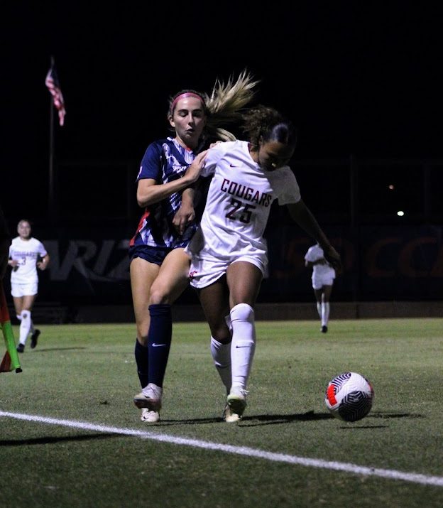 Midfielder Maddy Koleno trails a Washington State player on Thursday, Oct. 5, 2023, on Murphey Field at Mulcahy Soccer Stadium. Arizona Soccer lost to Washington State in a 2-1 decision.