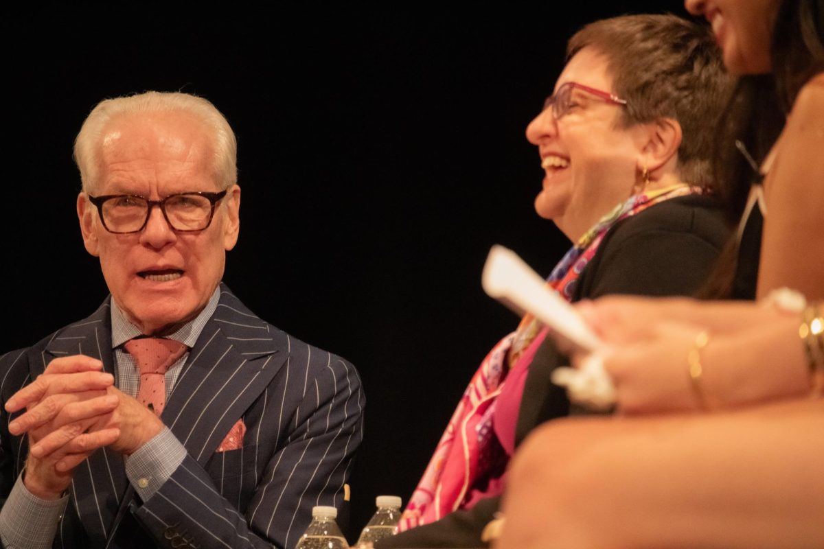 Tim Gunn sparks laughter on stage with Sarah Kortemeier and other moderators at the Poetry of Fashion event in Centennial Hall on Oct. 11. When asked about his least favorite fashion trend, Gunn responded, “When did leggings become a pant?”
