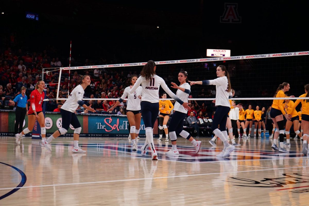 The UA Wildcats celebrate after scoring against the Cal Golden Bears in McKale Center on Sunday, Oct. 29. The Wildcats lost 3-0 and will try to bounce back on Friday against USC.
