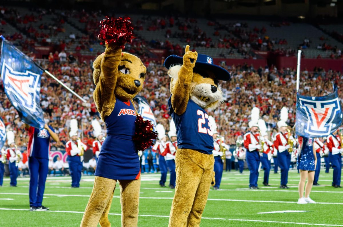 Wilbur and Wilma cheer at the start of the game against the UTEP Miners Saturday, Sept. 16 at Arizona Stadium. Wildcats took the win 31-10.