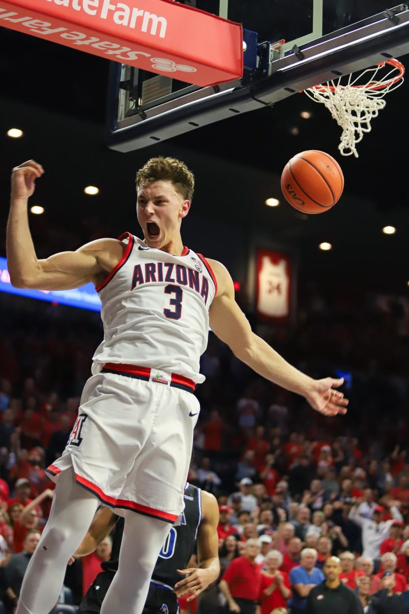Pelle Larsson celebrates a breakaway dunk against the University of Texas at Arlington in McKale Center on Sunday,  Nov. 19. Larsson gathered a game high of three offensive rebounds as well as scoring 13 points of his own.
