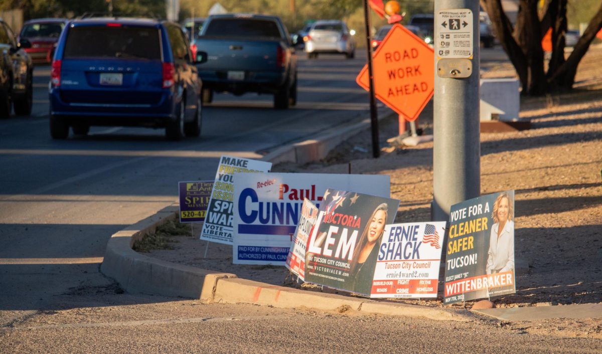 Campaign posters line the intersection of Glenn Street and Craycroft Road on Nov. 7. Today is Election Day for several city council positions and propositions as well as the mayor.
