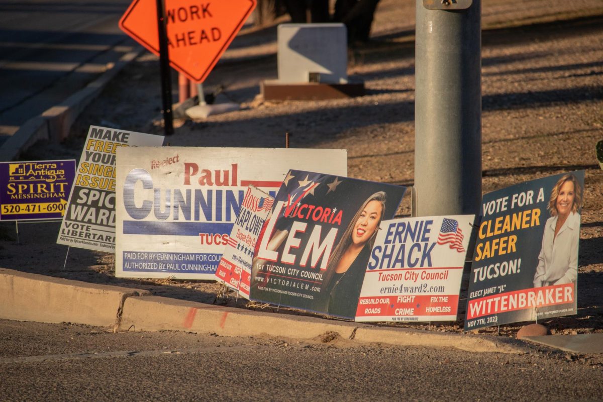 Campaign posters line the intersection of Glenn Street and Craycroft Road on Nov. 7. Today is Election Day for several city council positions and propositions as well as the mayor.