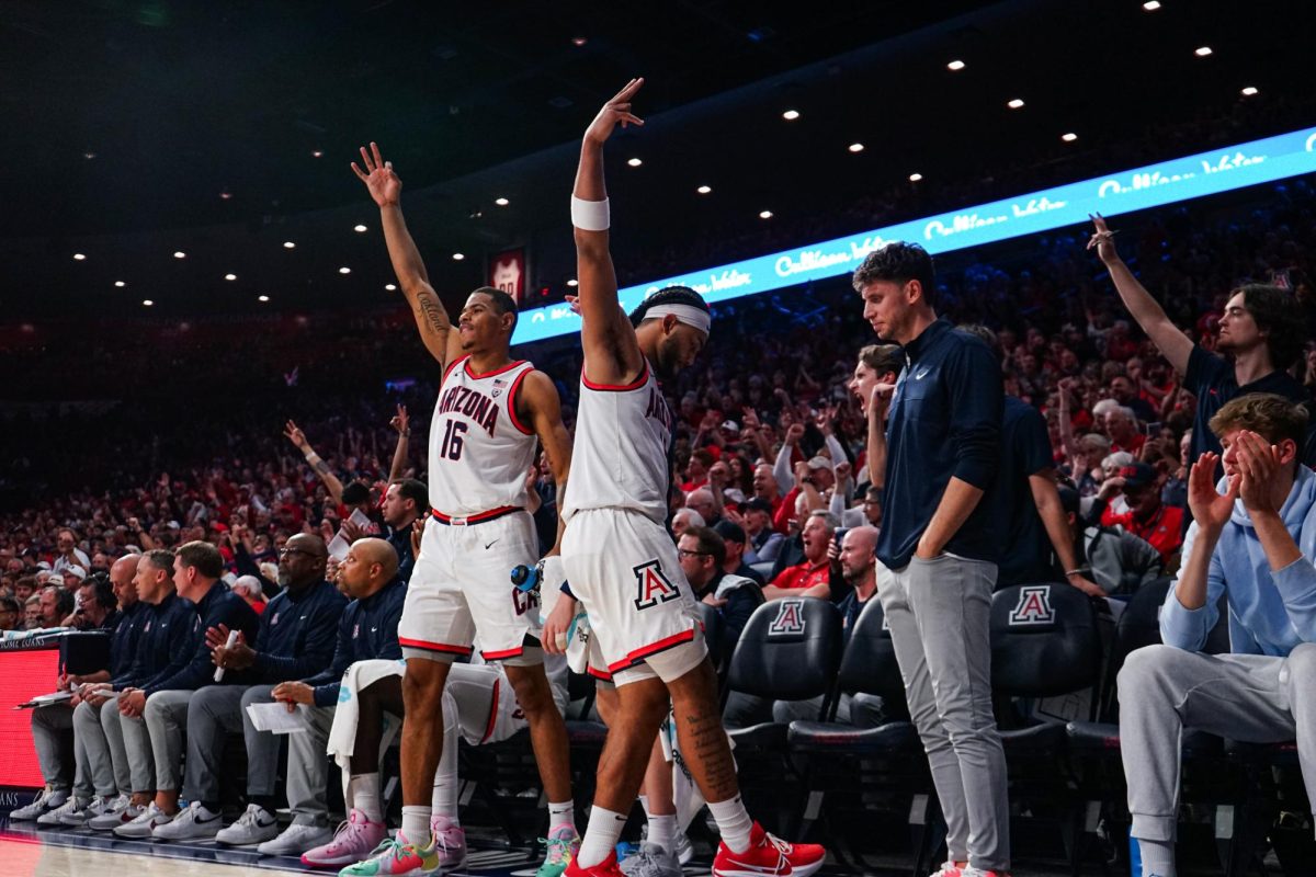 The Arizona mens basketball bench celebrate after Pelle Larsson makes a 3-pointer against Southern University in McKale Center on Monday, Nov. 13. The Wildcats have won the first three games of the season.