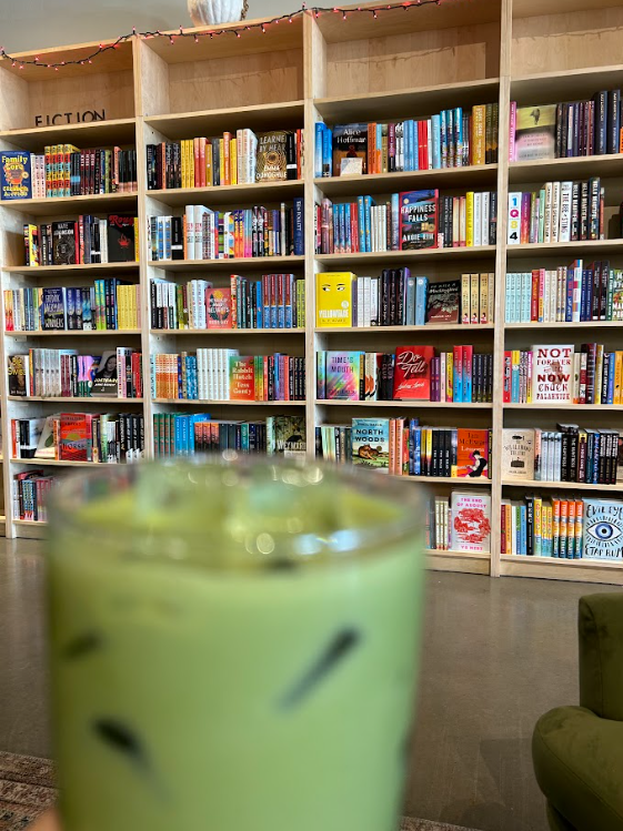 A small snippet of the store's books selection and matcha latte taken on Oct. 29 at Stacks Book Club in Oro Valley. The shop is open every day from 7 a.m. to 8 p.m.