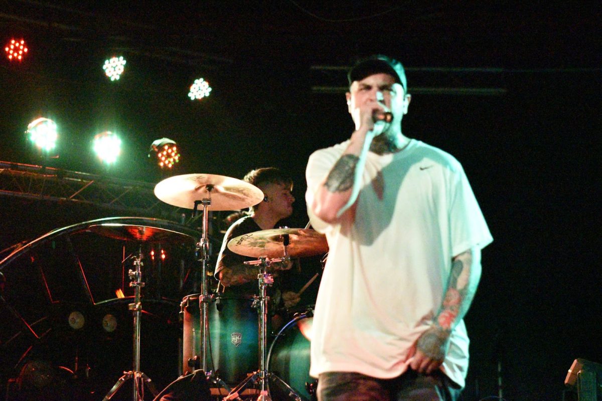 Frankie Palmeri (front) and Zach Allard (back) of the American metalcore band Emmure perform live at Encore on Nov. 7. The show was almost sold out. 