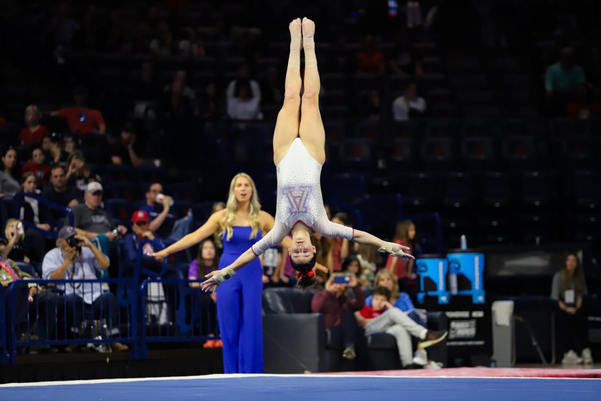 During+the+last+rotation+of+the+meet%2C+an+Arizona+gymnast+performs+a+front+aerial+during+her+floor+routine+against+Stanford+on+Jan.+27+in+McKale+Center.+The+team+scored+197.000+which+is+their+seventh-highest+score+in+program+history.%0A