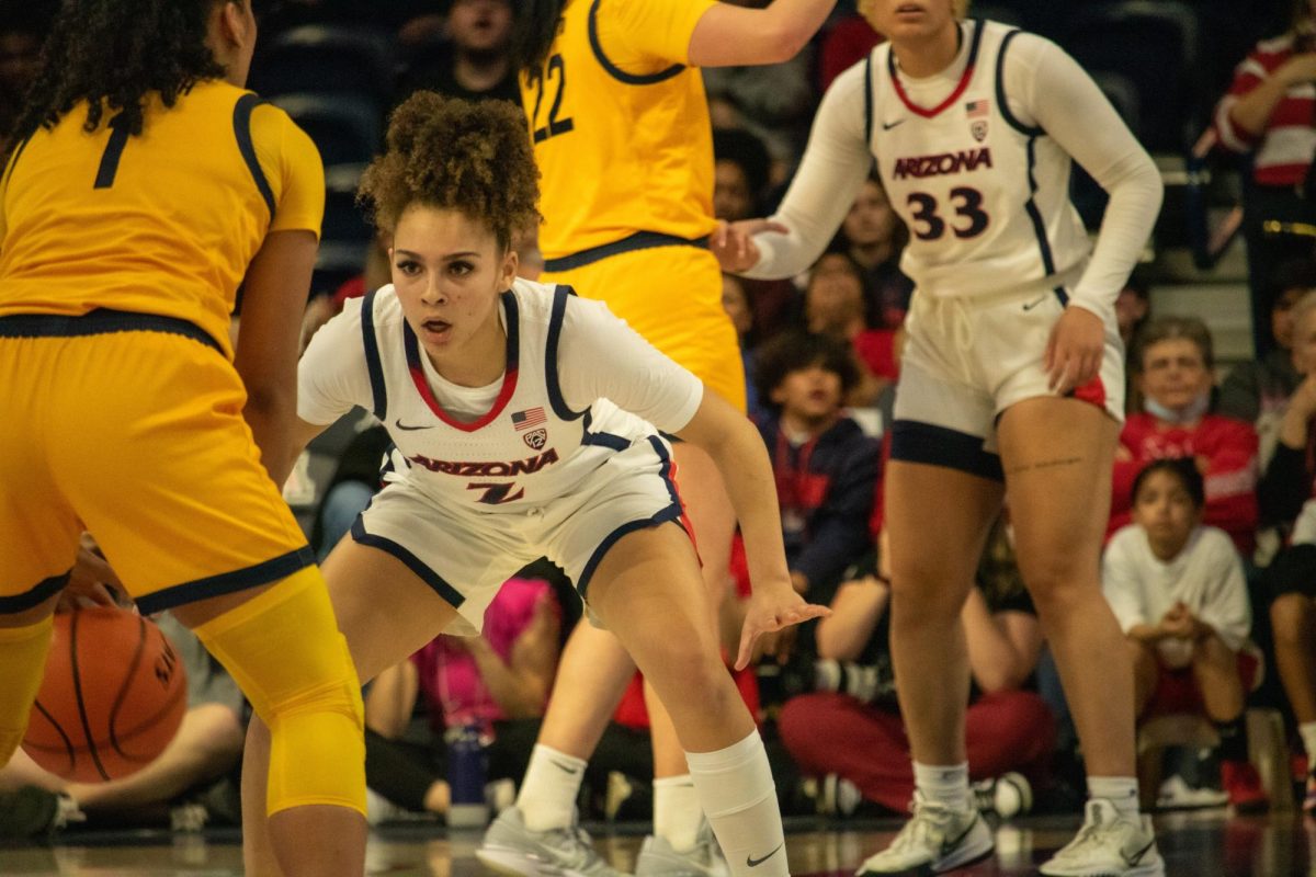 Jada+Williams+pulls+a+tight+defense+against+Cal+on+Jan.+26+in+McKale+Center.+The+freshman+guard+scored+13+points+for+the+game.