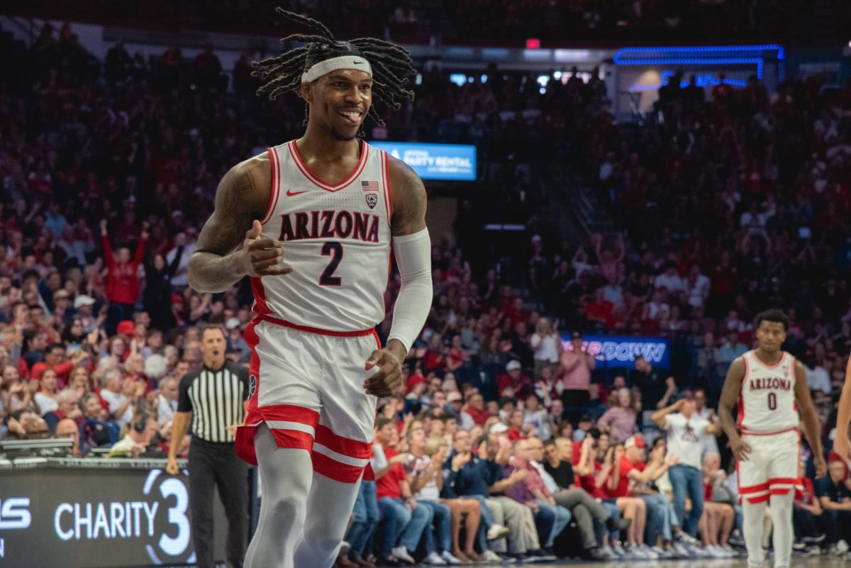 Caleb Love celebrates his shot against University of Washington in McKale Center on Feb. 24. Love scored 28 points to eclipse 2,000 for his career.