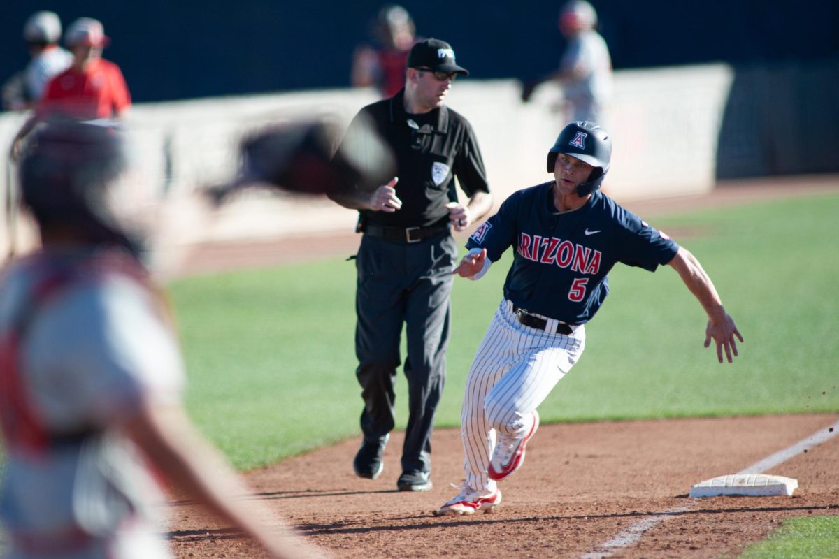 Cole Dillon makes his way around third base to make it home against Utah Tech at Hi Corbett Field on Feb. 20. Wildcats took the win 24-4.

