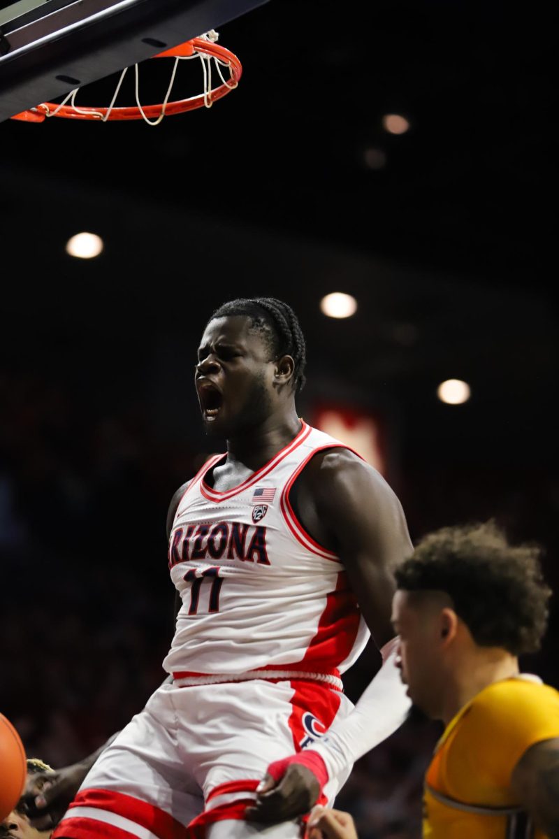 Oumar Ballo celebrates after a dunk on the very first play of Arizonas rivalry game against Arizona State in McKale Center on Feb 17. Ballo led the game in rebounds with a game high of 11.
