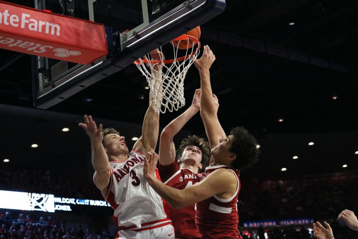 Pelle Larsson attempts a shot against Stanford in McKale Center on Feb. 4. Arizona turned the game around in the second period when they made 48 points towards an 82-71 win.