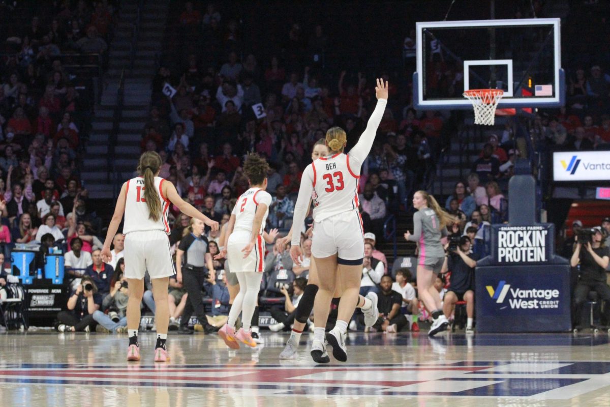 Isis Beh makes a 3-pointer in the third quarter putting Arizona 56-31 in the Washington State game in McKale Center on Feb. 16. Beh made her first 3-pointer as a Wildcat. 