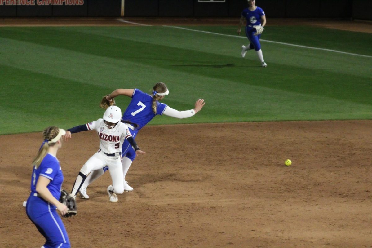 Arizonas Zaedi Tagalog makes it to second base at the Hillenbrand Invitational against Drake on Feb. 22. Zaedi makes after Drake Bulldog Destiny Lewis misses the ball thrown to second.