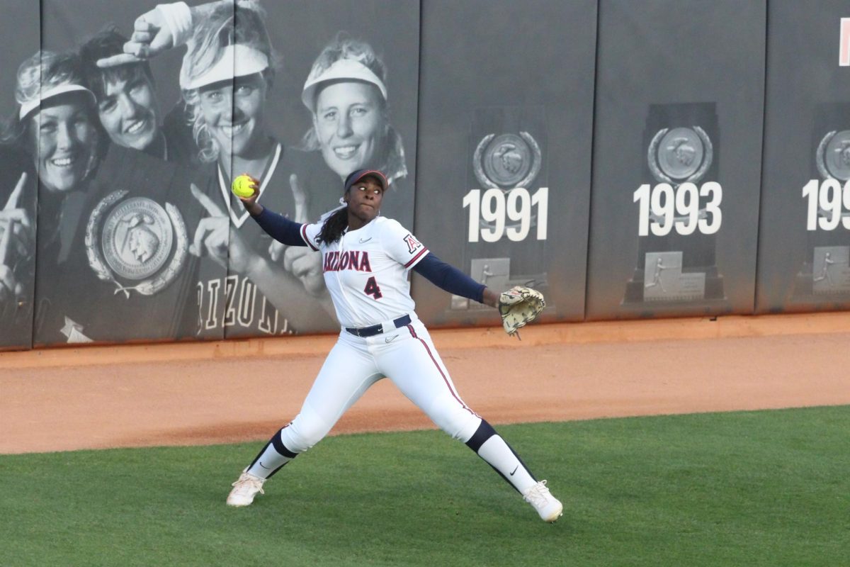 Arizona Dakota Kennedy throws the ball infield from left field at the Hillenbrand Invitational against Drake on Feb. 22. Kennedy was one of the Wildcats game leaders for hitting with three at bats, one run, one hit and one RBI.