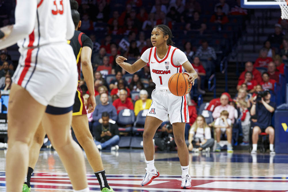 Arizona's Courtney Blakely dribbles the ball looking for a pass during the USC game in Mckale Center on Feb. 29. Arizona lost 95-93. 